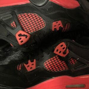 Red Thunder Jordan 4’s